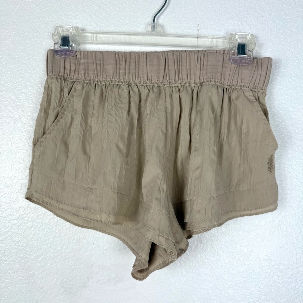 Free people movement Beige/tan low rise shorts size XS